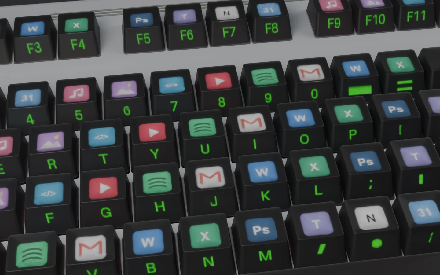 Prototype keyboard render with familiar app icons including YouTube, Spotify, Mail, Word and Photoshop projected on the keytops